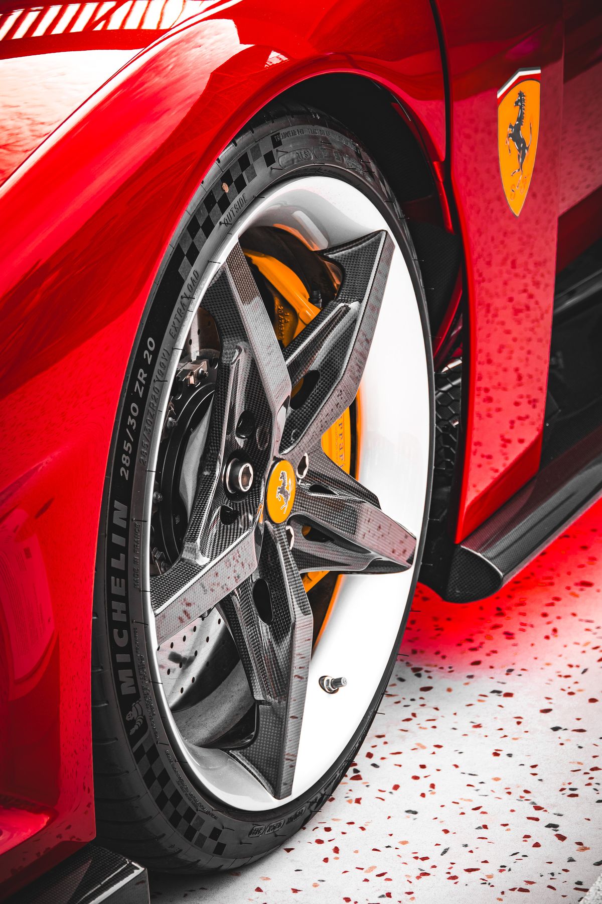 Ferrari F80 carbon-fibre wheel with yellow brake caliper and Michelin tyre